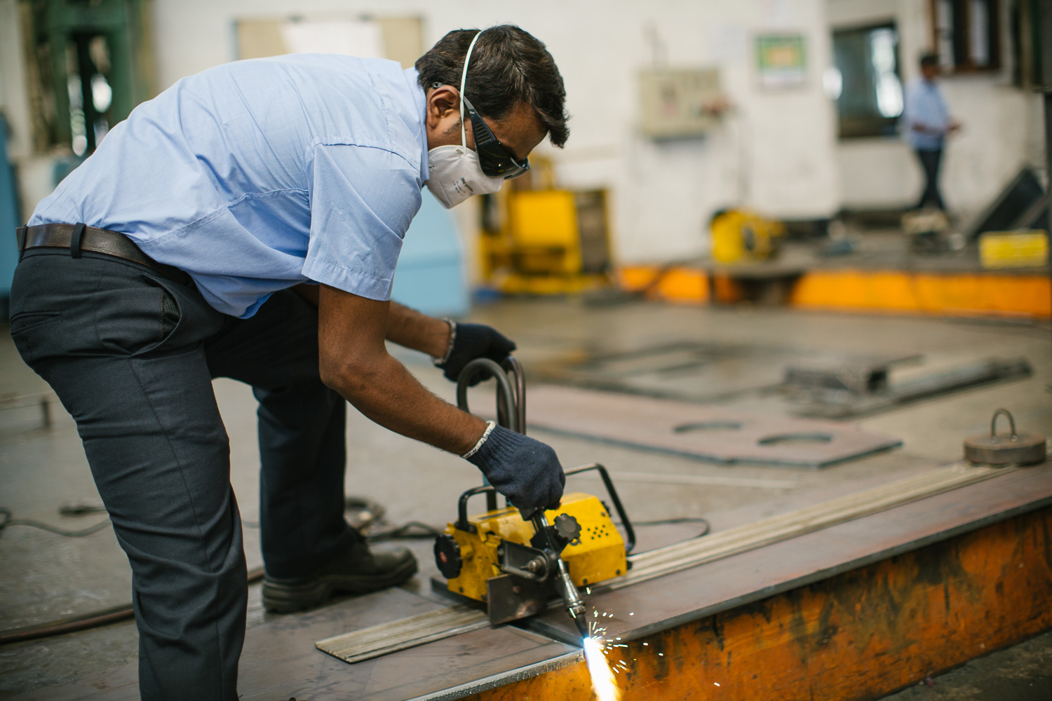Worker at Tumkur factory